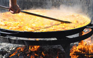 Cooking Paella On An Open Fire